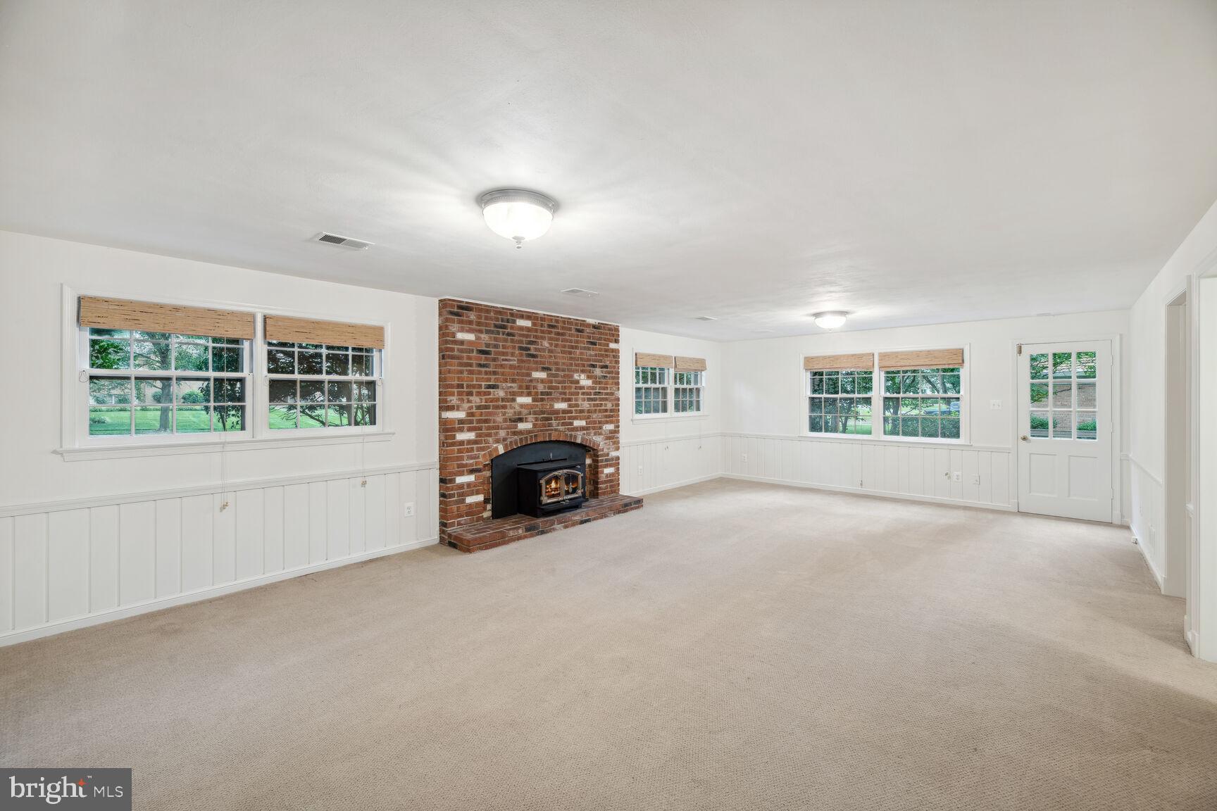 6313 Stoneham Lane McLean, VA 22101 - Photo 26 of 37 Very large basement with wood burning fireplace