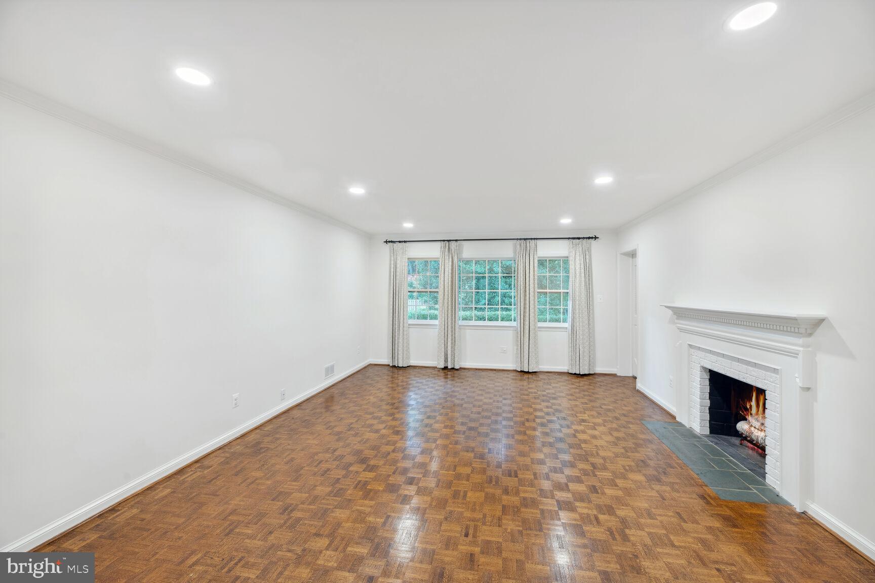 6313 Stoneham Lane McLean, VA 22101 - Photo 5 of 37 New lighting and gleaming hardwood floors