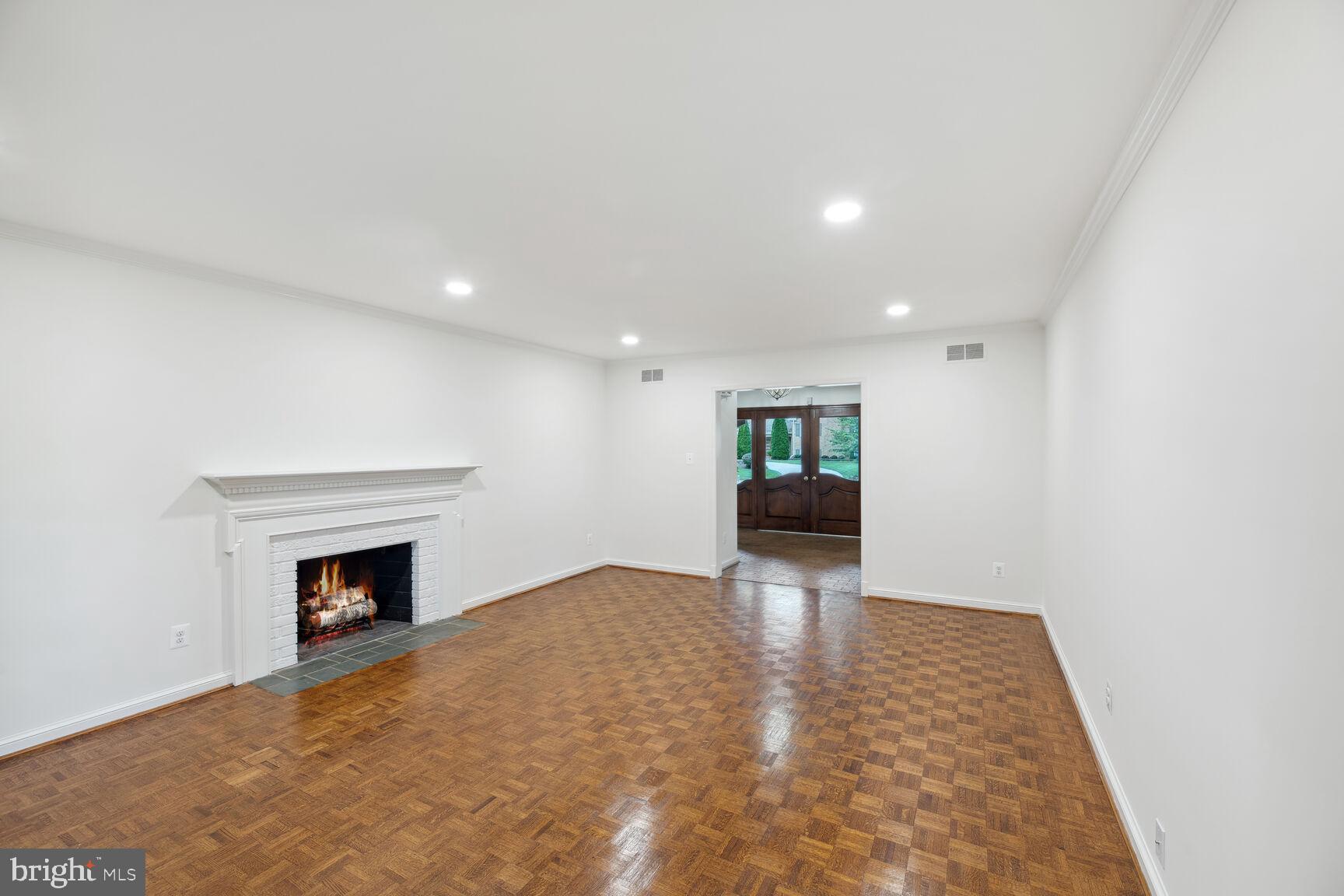 6313 Stoneham Lane McLean, VA 22101 - Photo 6 of 37 New lighting and gleaming hardwood floors