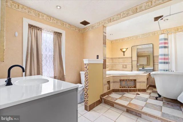 a view of a chairs and tables in the balcony