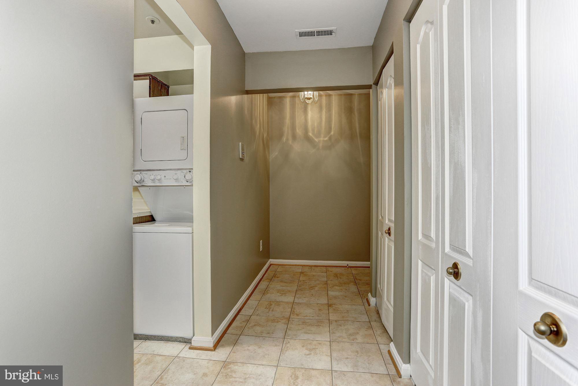8613 Falls Run Road, Unit J Ellicott City, MD 21043 - Photo 2 of 20 Foyer