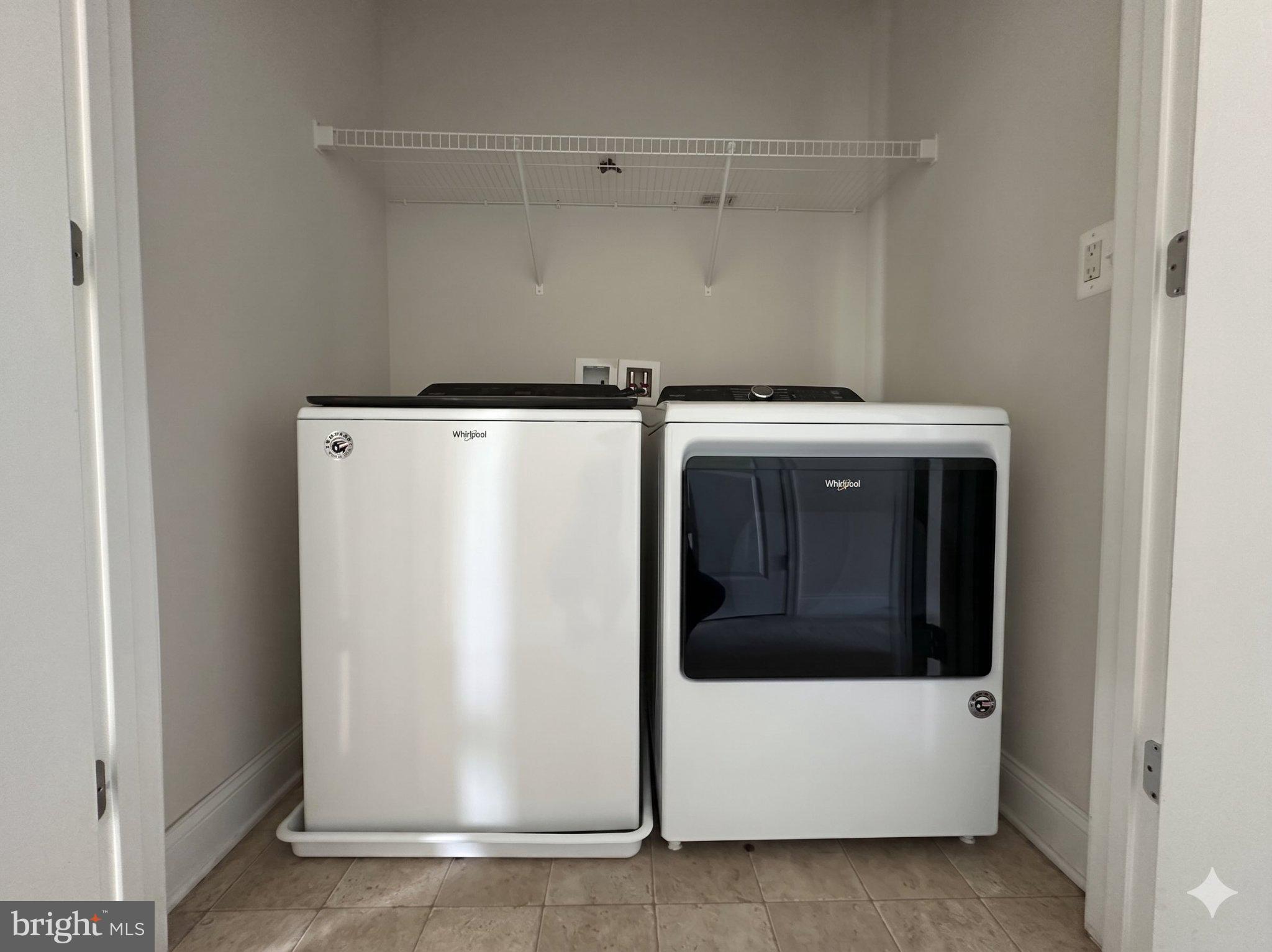 17109 Branched Oak Road Dumfries, VA 22026 - Photo 19 of 24 Modern laundry nook with appliances.