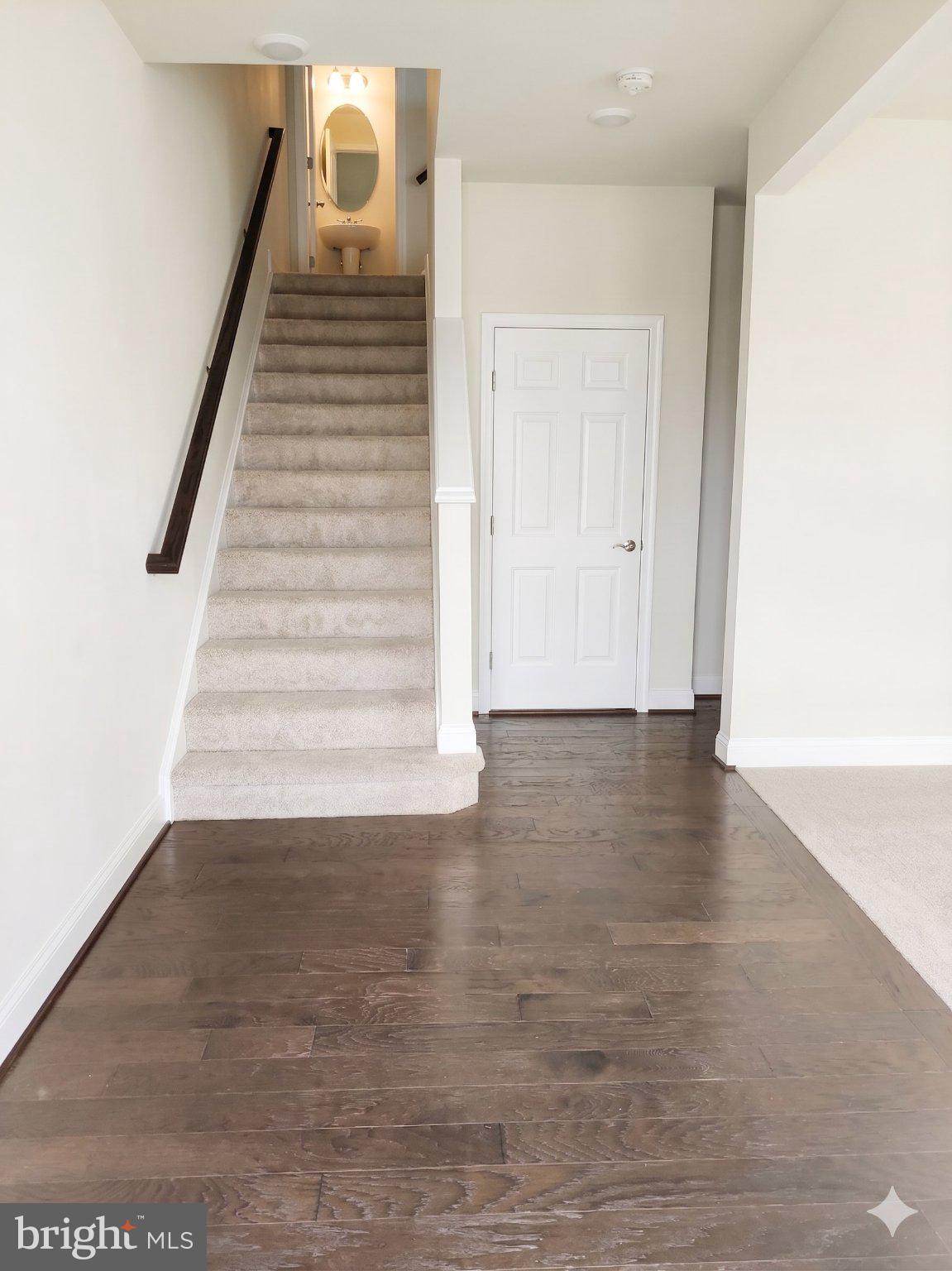 17109 Branched Oak Road Dumfries, VA 22026 - Photo 4 of 24 Inviting entryway with elegant stairs.