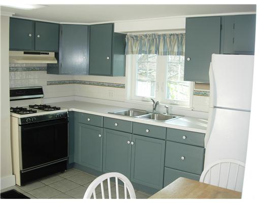 4299 Old Post Road Charlestown, RI 02813 - Photo 3 of 12 Kitchen. Kitchen has large dining area, tile back splash, and is bright and sunny.