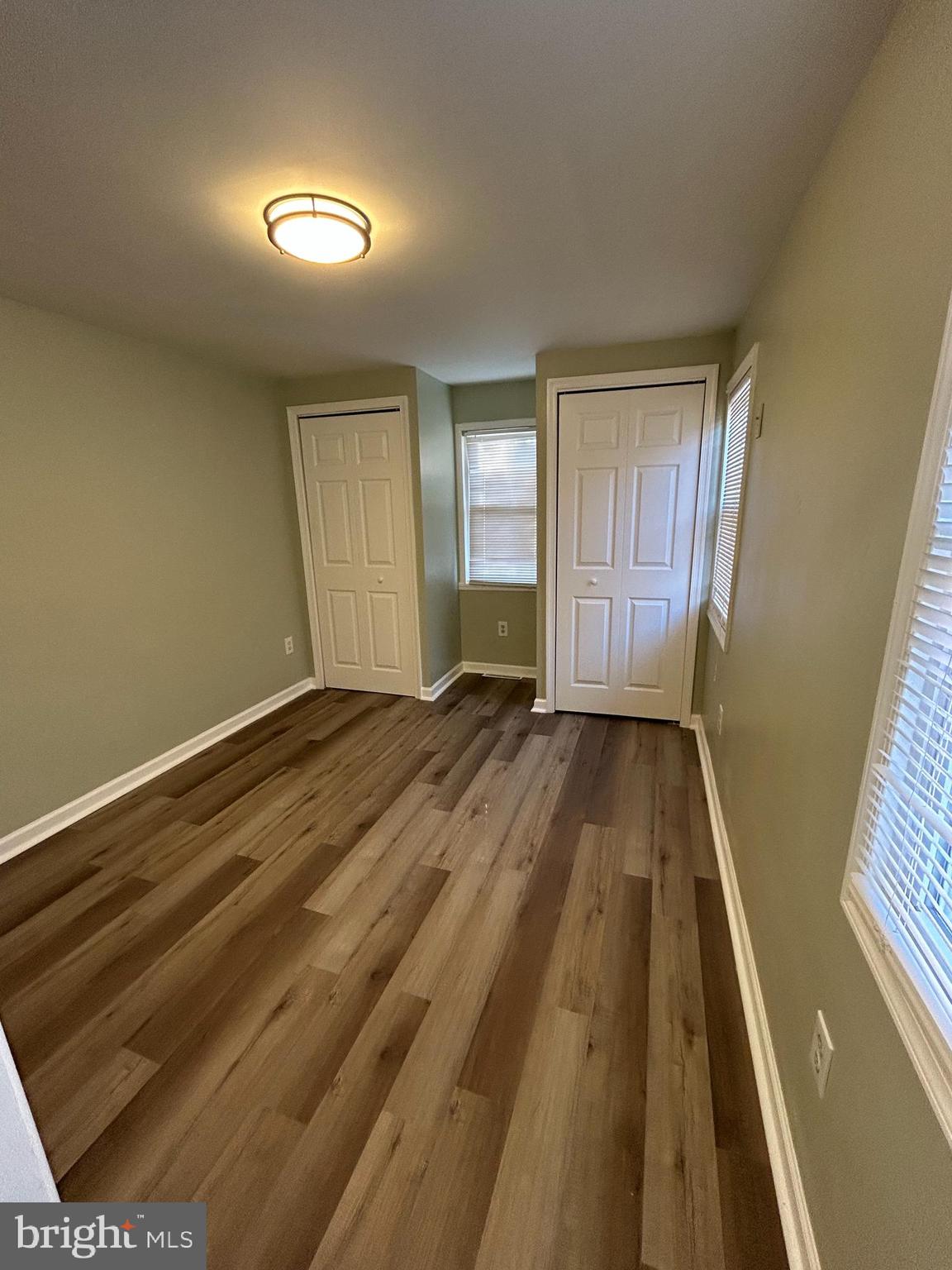 1 Michigan Road Pennsville, NJ 08070 - Photo 11 of 22 a view of a room with wooden floor and white walls