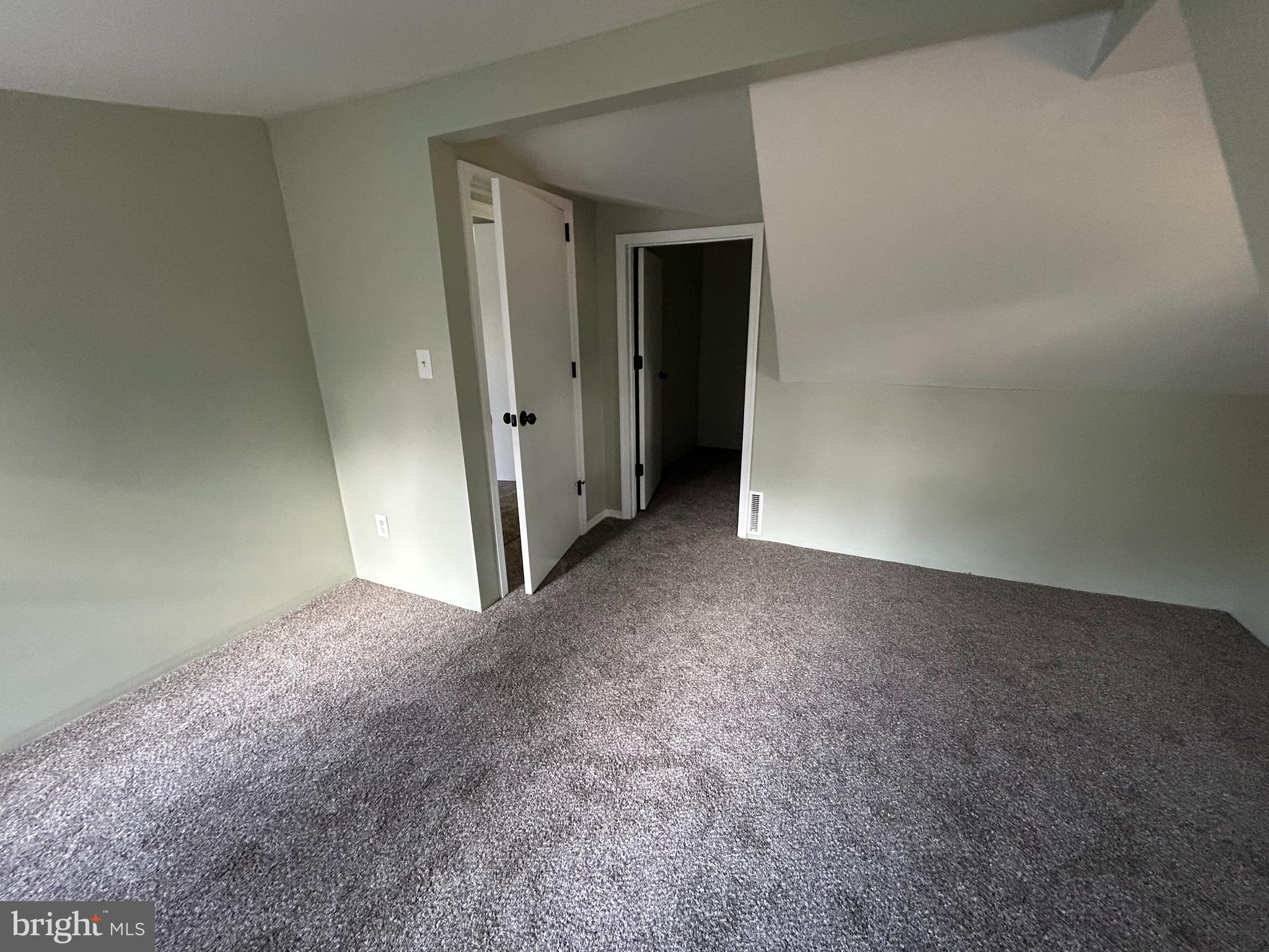1 Michigan Road Pennsville, NJ 08070 - Photo 17 of 22 a view of a big room with closet and wooden floor