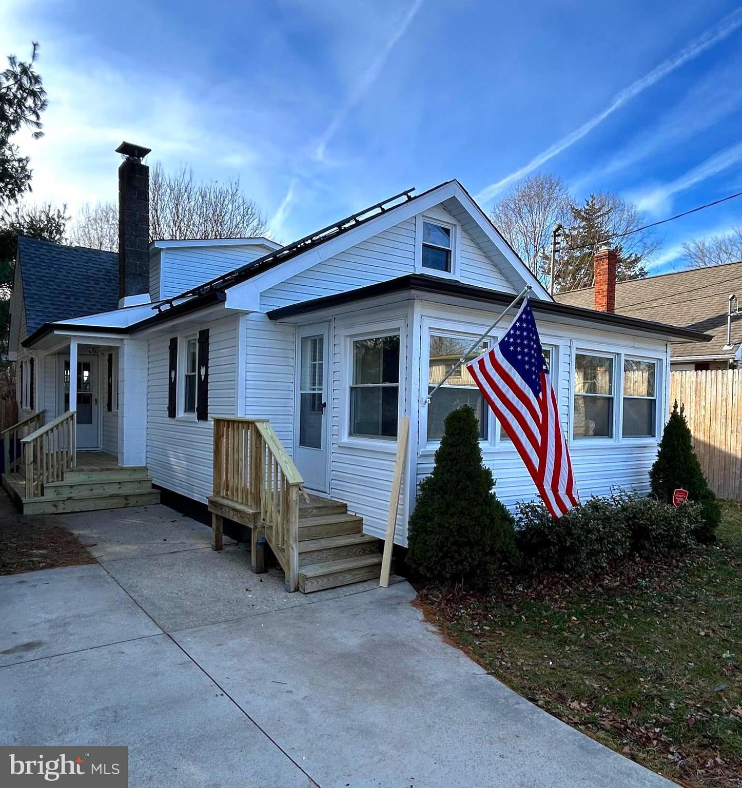 1 Michigan Road Pennsville, NJ 08070 - Photo 2 of 22 a front view of a house with garden