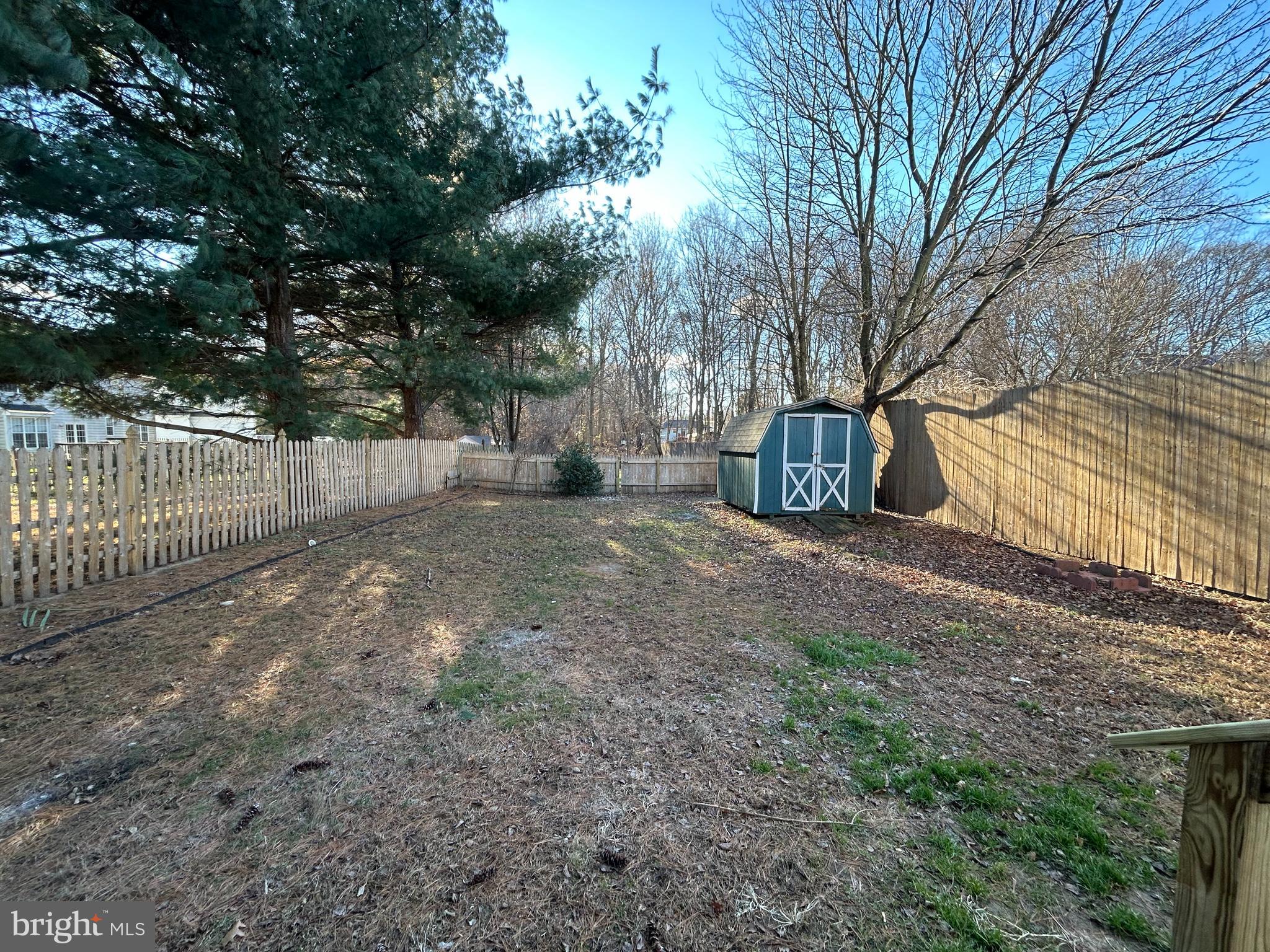 1 Michigan Road Pennsville, NJ 08070 - Photo 21 of 22 a view of a backyard with large trees