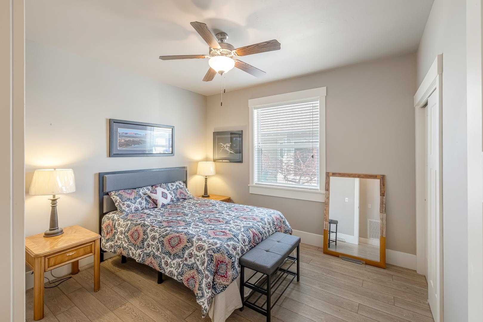 1206 Periwinkle Lane Fruita, CO 81521 - Photo 13 of 20 a bedroom with a bed and a window
