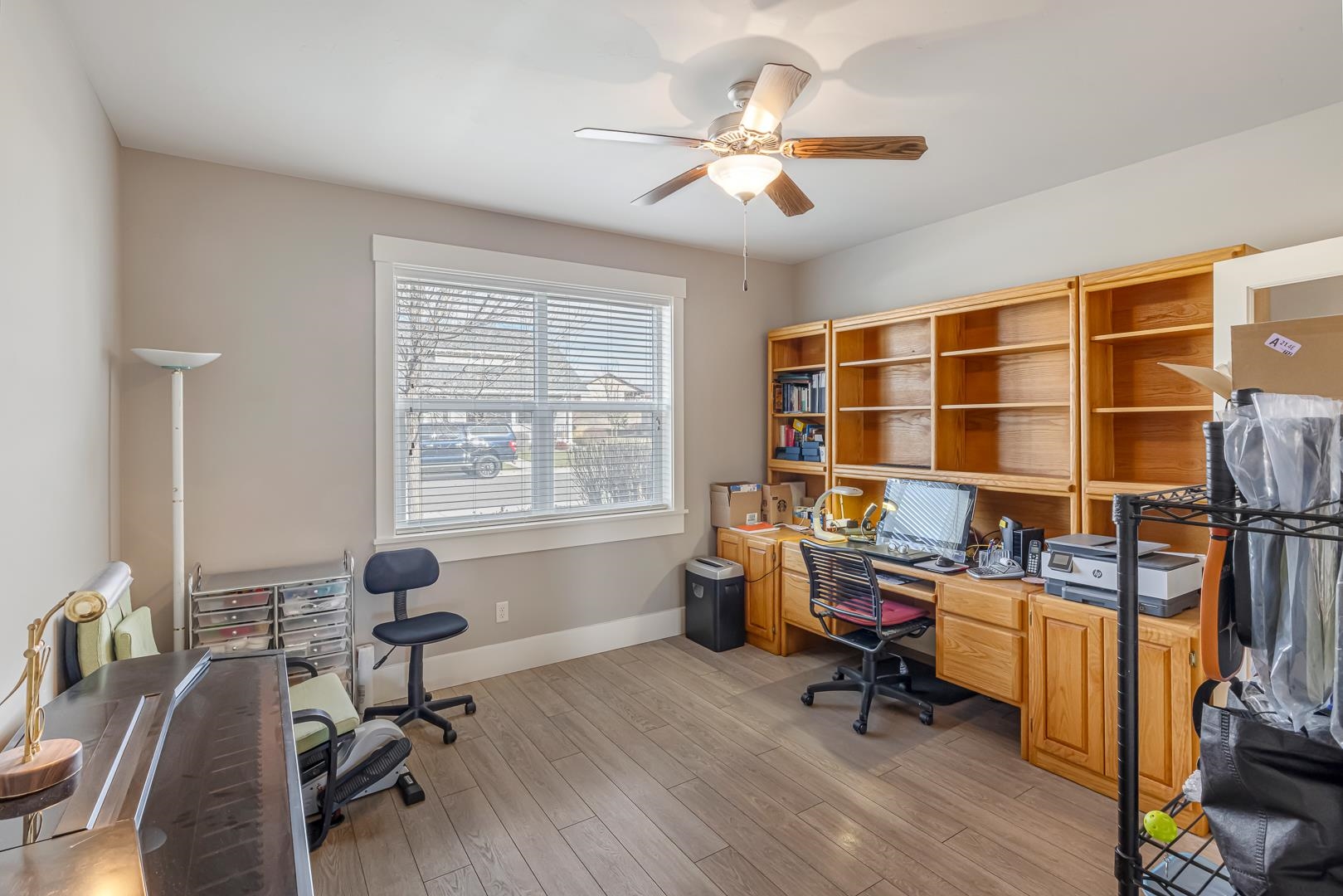1206 Periwinkle Lane Fruita, CO 81521 - Photo 7 of 20 a view of a workspace with furniture and a window