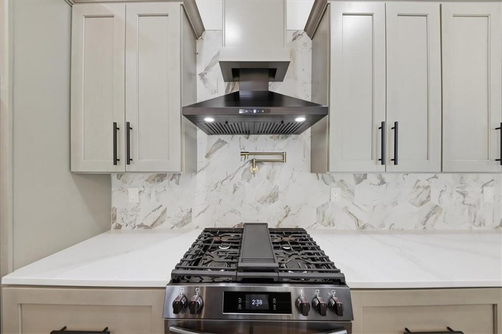 4107 Danforth Road Southwest Atlanta, GA 30331 - Photo 20 of 64 a stove top oven sitting inside of a kitchen