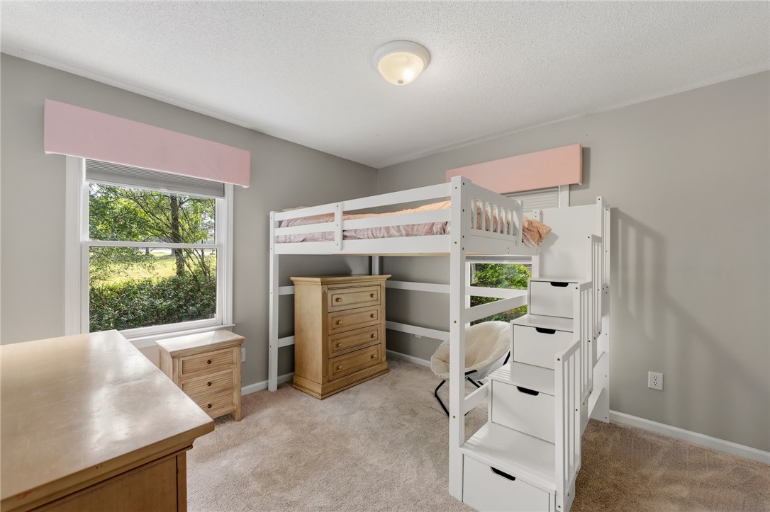 1014 East Queen Street Pendleton, SC 29670 - Photo 30 of 43 Restful bedroom featuring a loft bed and warm, inviting carpet flooring.