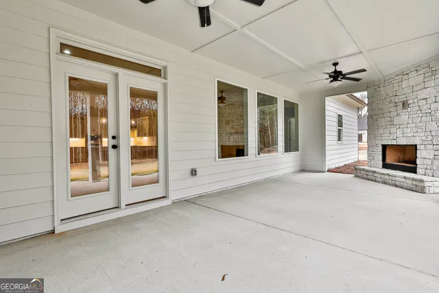 a view of a livingroom with a flat screen tv