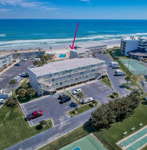 a view of a balcony with chairs