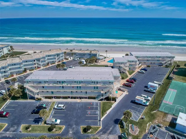 a view of a kitchen with a sink and a microwave