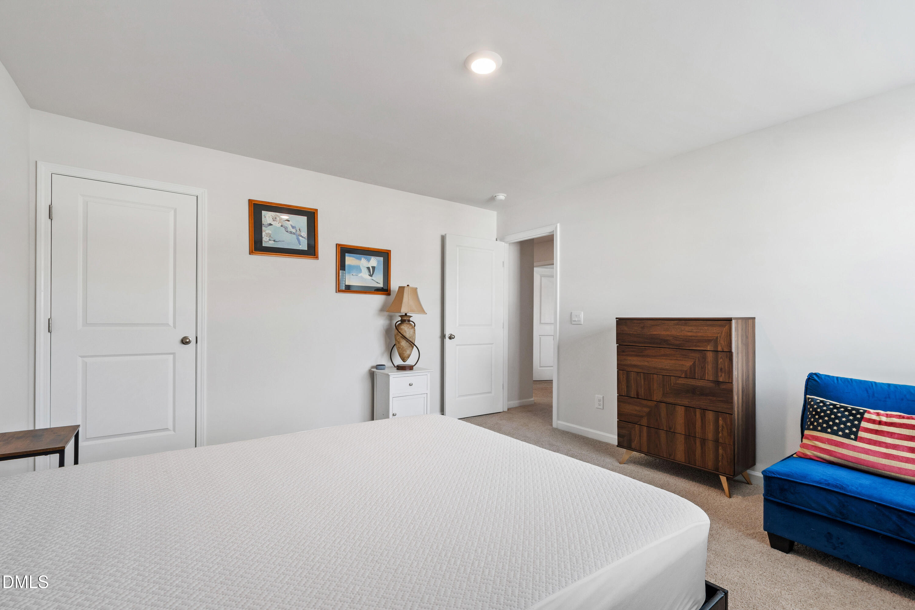 2128 Fletchers Ridge Drive Durham, NC 27703 - Photo 26 of 38 a bedroom with a bed and a cabinets