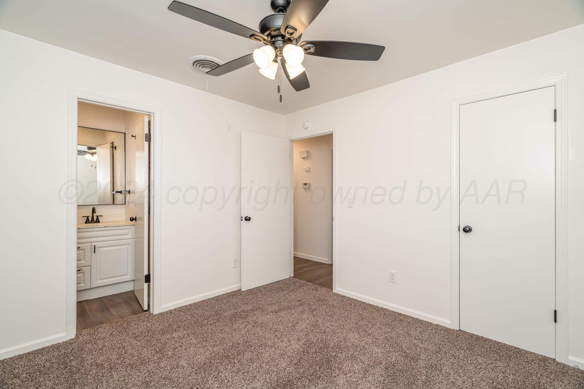 3206 Wind Song Drive Amarillo, TX 79103 - Photo 14 of 27 wooden floor in an empty room