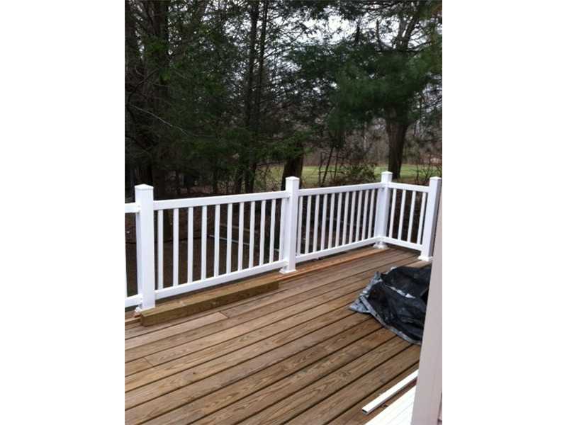 174 William Henry Road Scituate, RI 02857 - Photo 6 of 6 Patio/Deck. Back deck - newly refaced deck; deck wraps from the side of home to the entire back. Overlooks back yard and field....very private.