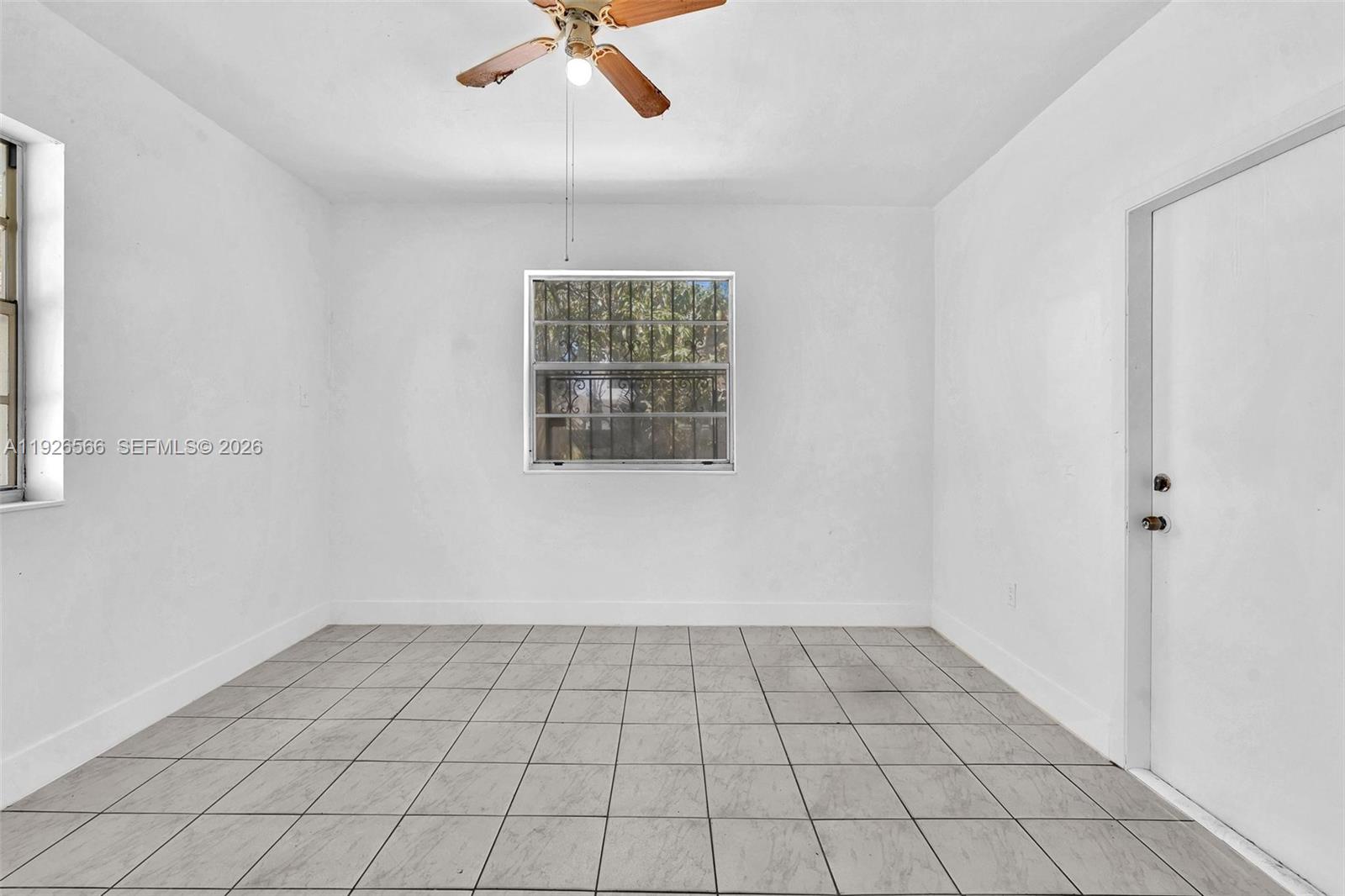 2839 Southwest 24th Street, Unit 2 Miami, FL 33145 - Photo 11 of 15 a view of an empty room and a window