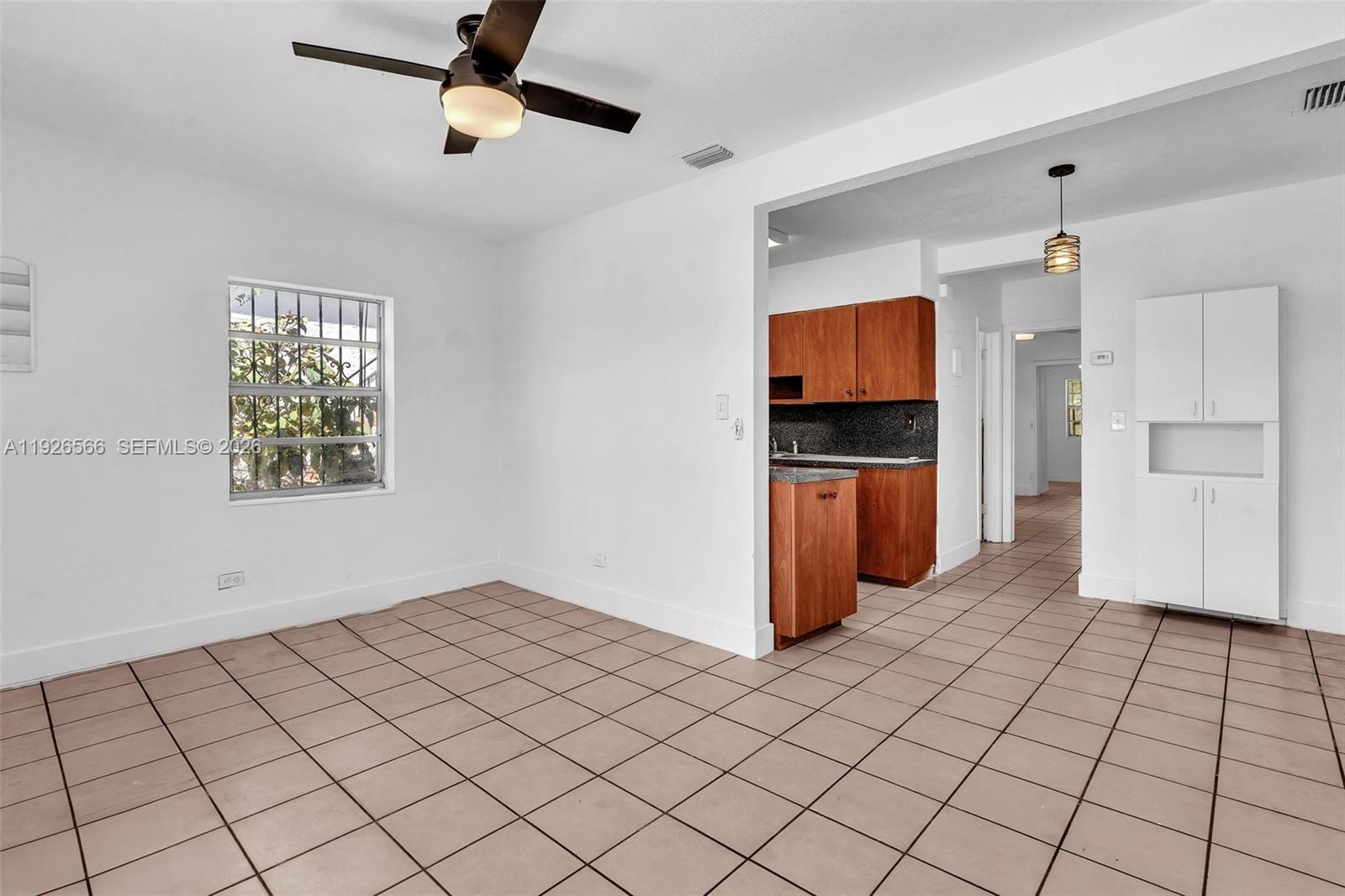 2839 Southwest 24th Street, Unit 2 Miami, FL 33145 - Photo 4 of 15 a view of kitchen with furniture and refrigerator