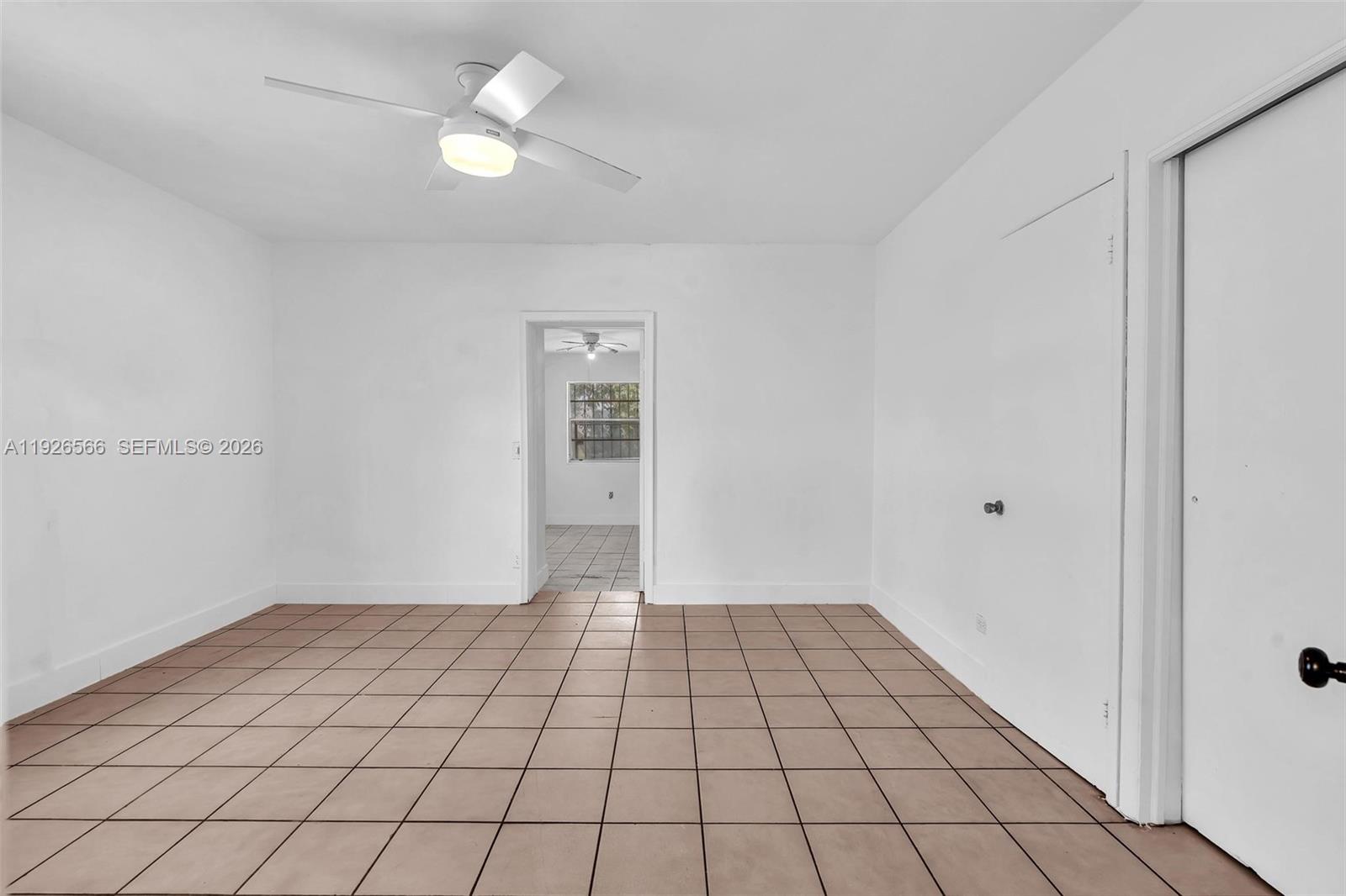 2839 Southwest 24th Street, Unit 2 Miami, FL 33145 - Photo 9 of 15 a view of an empty room and window