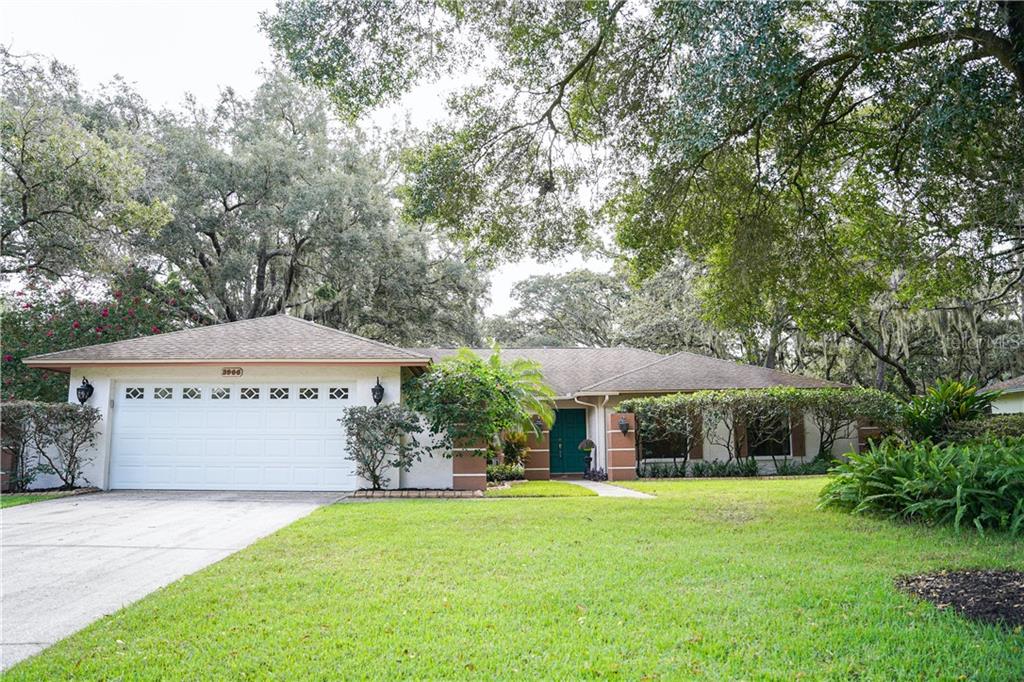 3906 Applegate Circle Brandon, FL 33511 - Photo 1 of 1 a front view of a house with garden