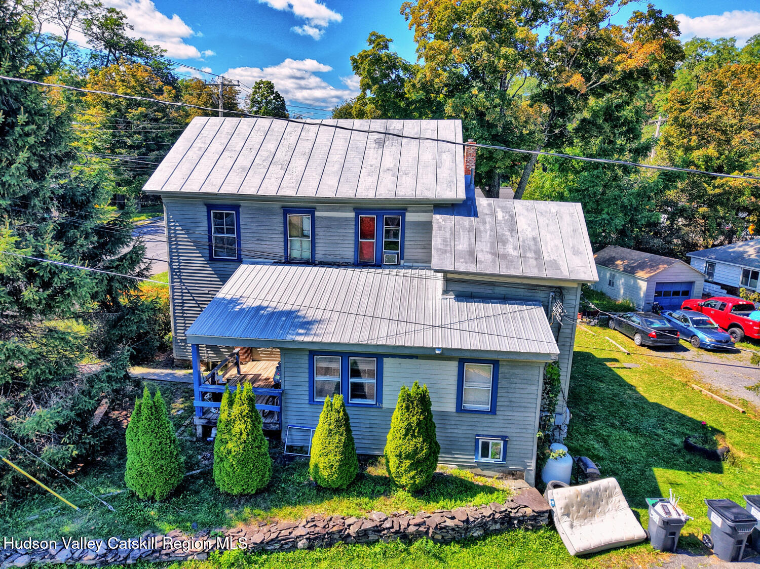 606 Main Street Cairo, NY 12413 - Photo 12 of 70 an aerial view of a house roof deck with chairs and flower plants