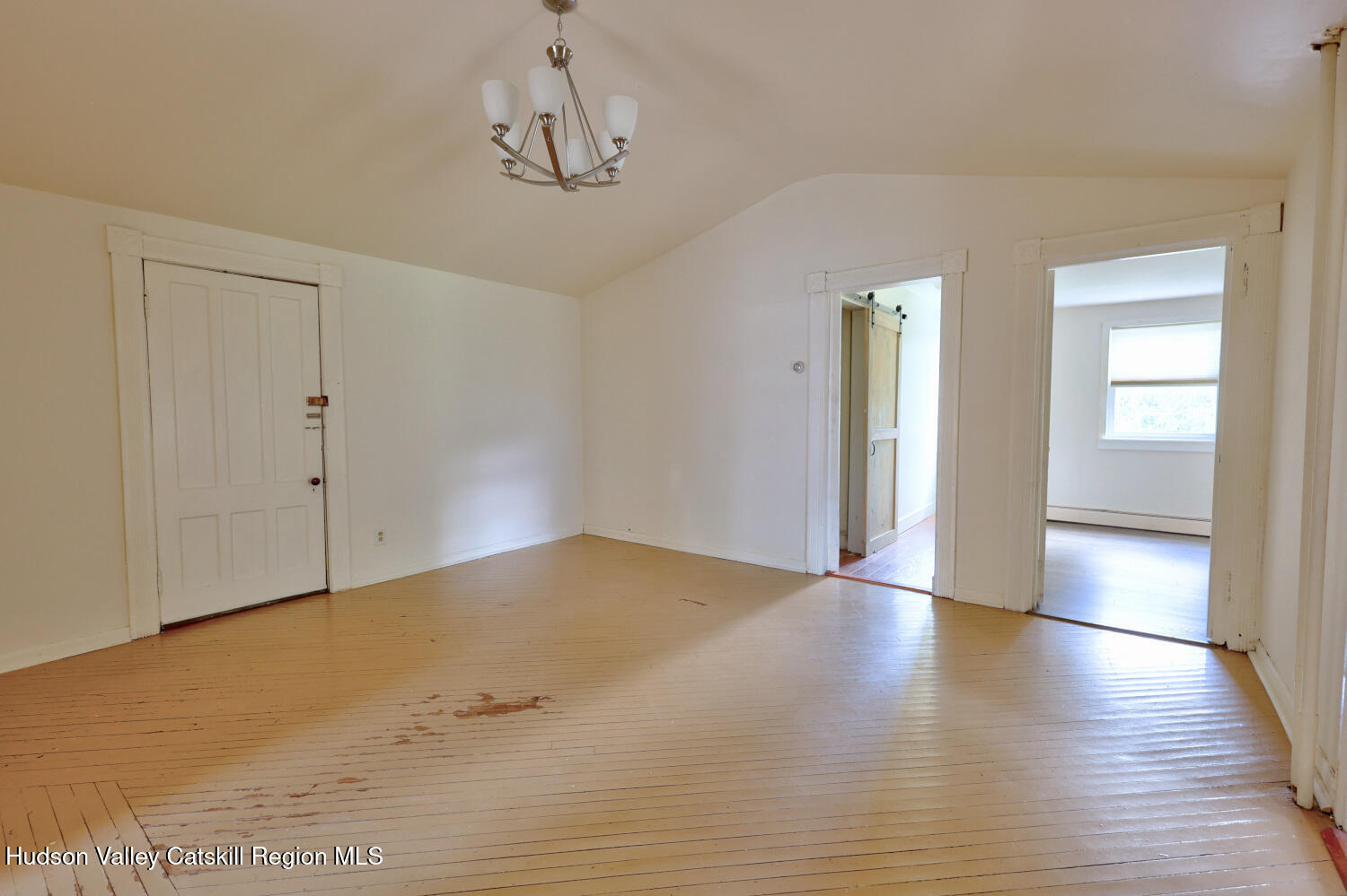 606 Main Street Cairo, NY 12413 - Photo 31 of 70 a view of empty room with wooden floor and fan