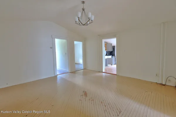 a view of a bathroom with wooden floor