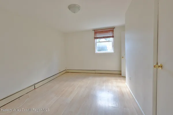 a kitchen with stainless steel appliances granite countertop a stove and a wooden cabinets