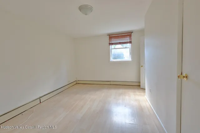 a kitchen with stainless steel appliances granite countertop a stove and a wooden cabinets