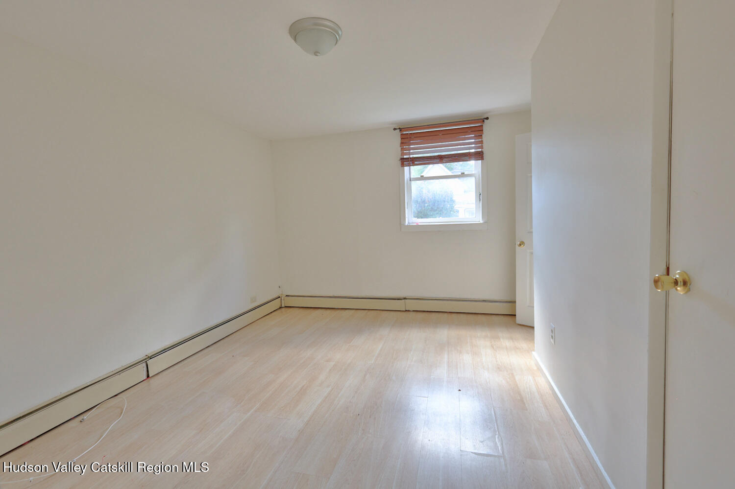 606 Main Street Cairo, NY 12413 - Photo 33 of 70 a view of a small space with wooden floor and a window