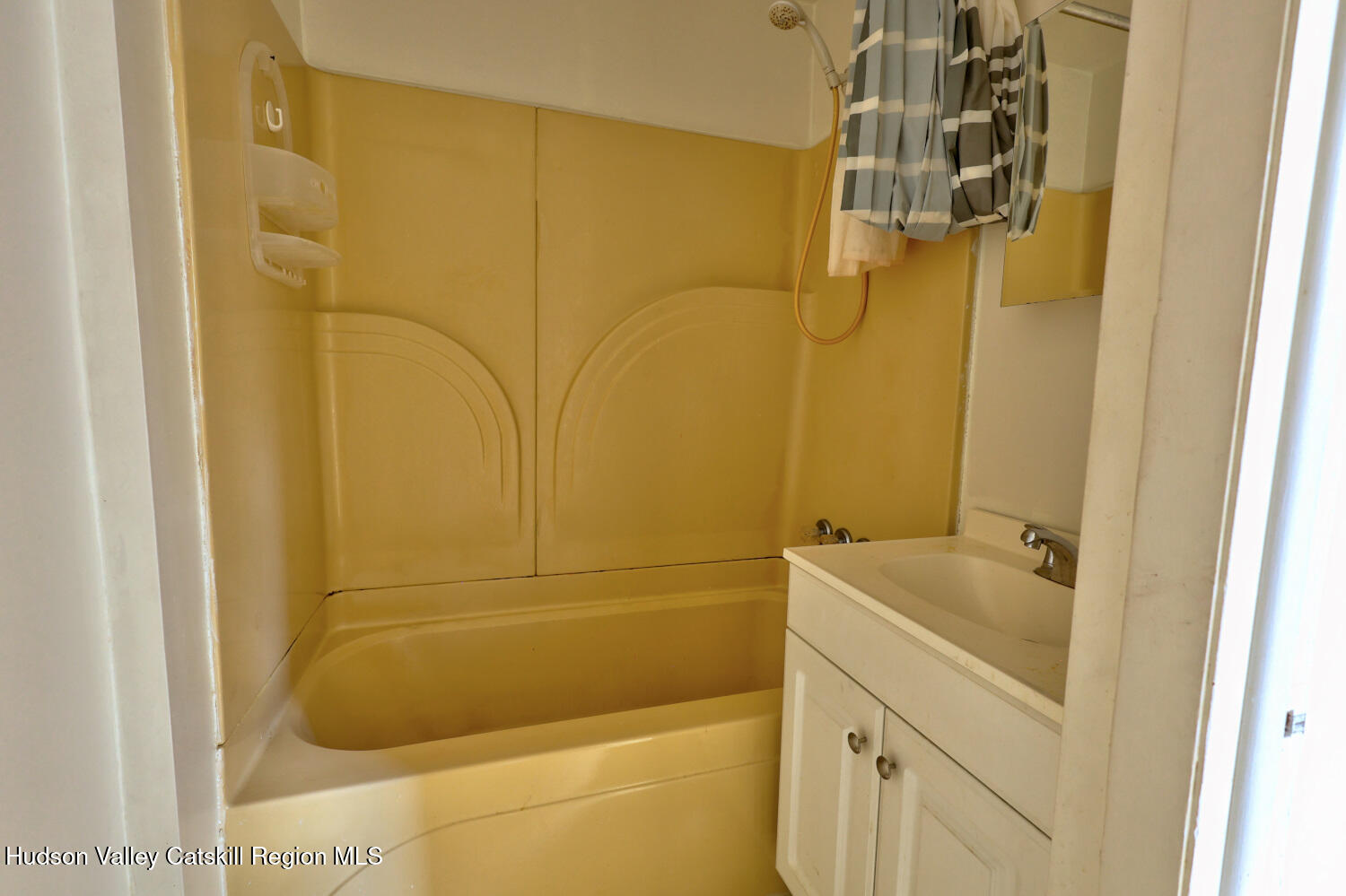 606 Main Street Cairo, NY 12413 - Photo 36 of 70 a bathroom with a shower and a sink