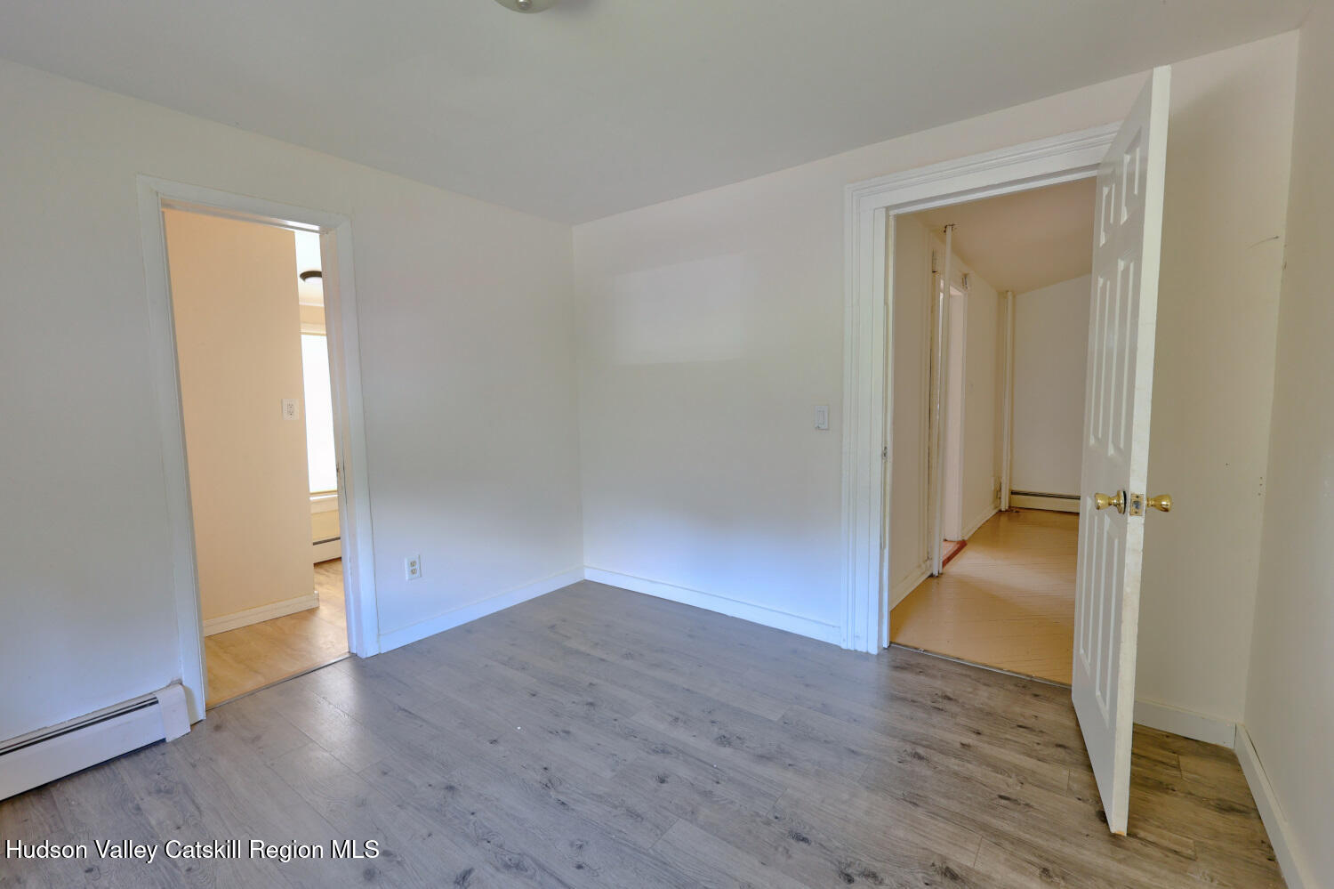 606 Main Street Cairo, NY 12413 - Photo 39 of 70 an empty room with wooden floor and closet