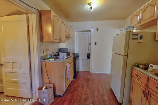 a view of a yard with swimming pool