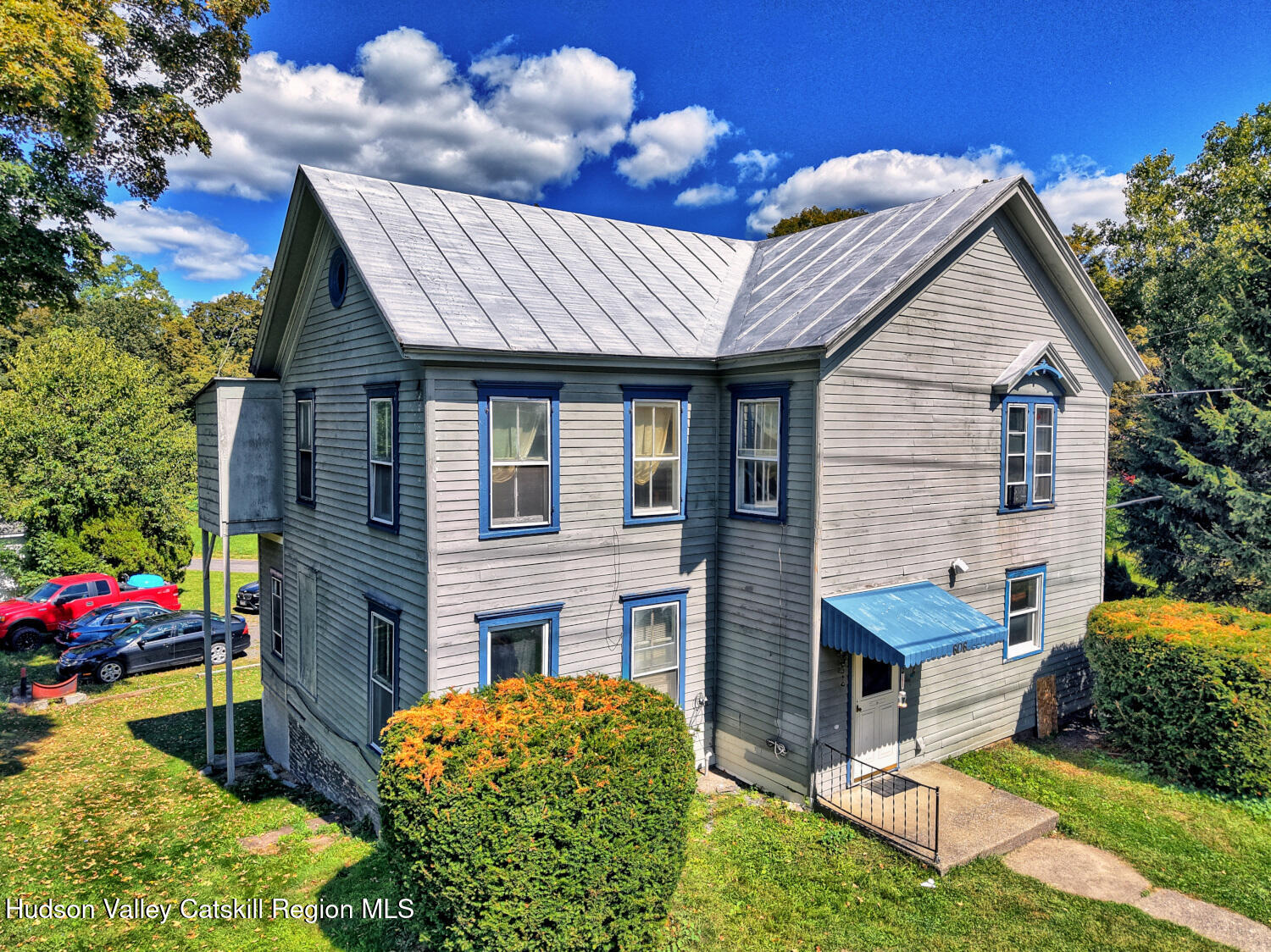 606 Main Street Cairo, NY 12413 - Photo 56 of 70 a front view of a house with garden
