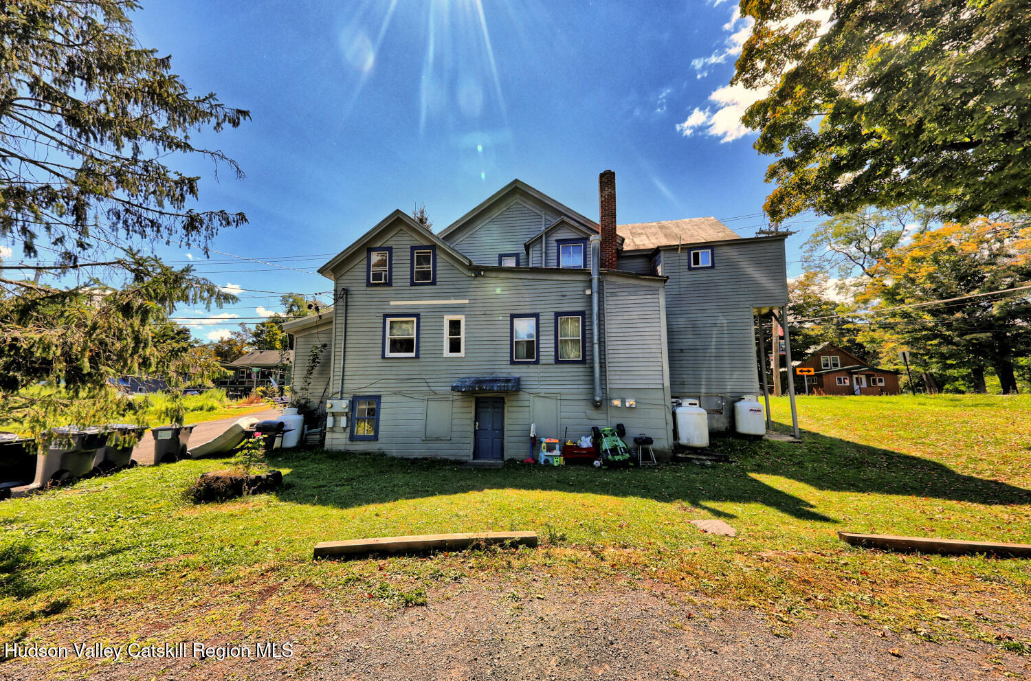 606 Main Street Cairo, NY 12413 - Photo 69 of 70 a front view of a house with a yard table and chairs