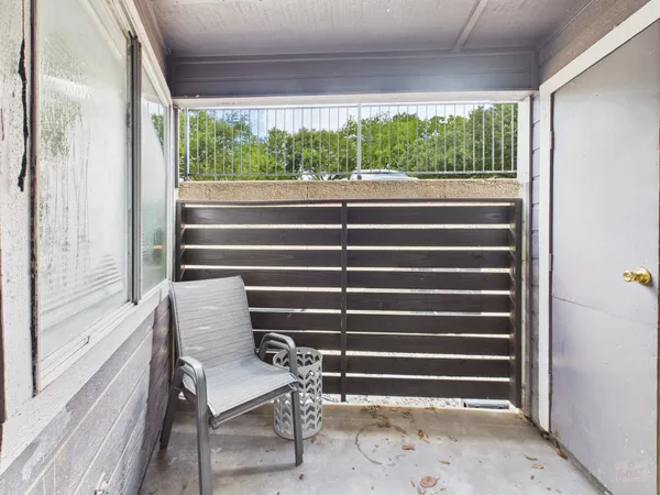 a room view with a bench