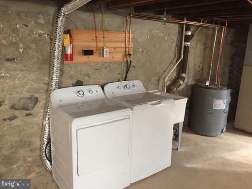 715 South 23rd Street, Unit 1F Philadelphia, PA 19146 - Photo 12 of 12 a utility room with dryer and washer