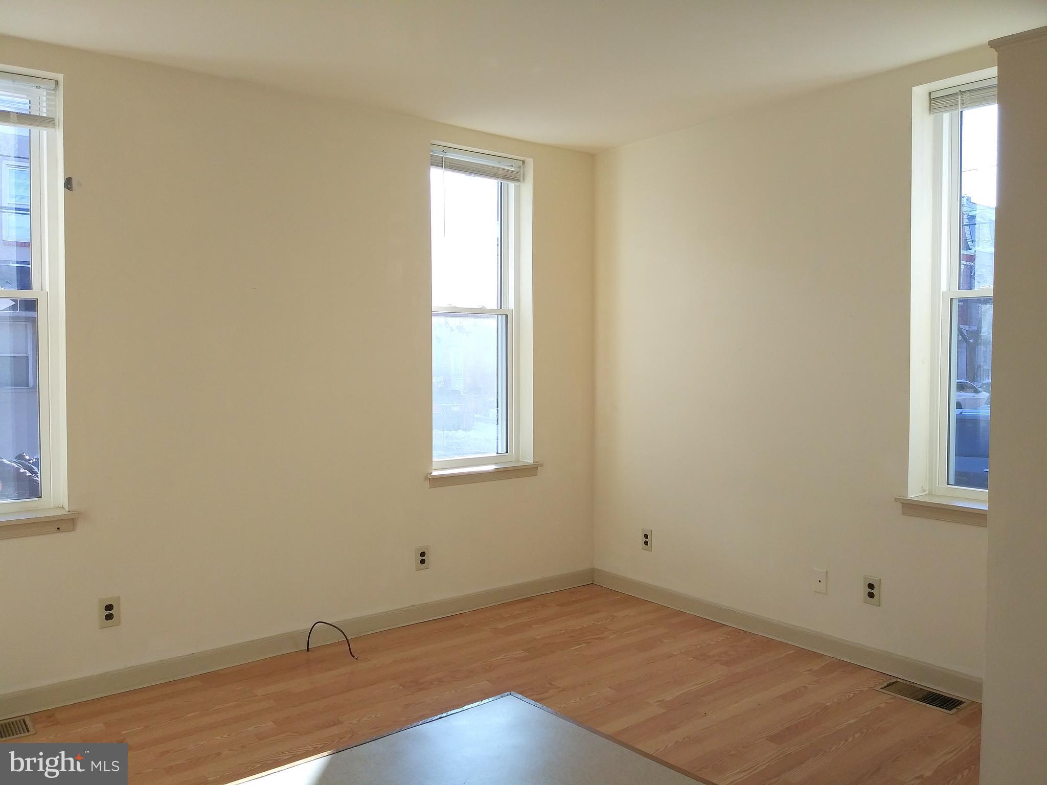 715 South 23rd Street, Unit 1F Philadelphia, PA 19146 - Photo 6 of 12 an empty room with a window