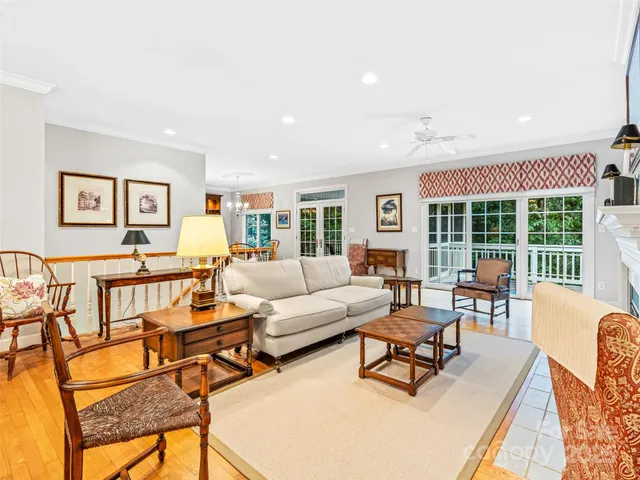 a dining room with furniture and wooden floor