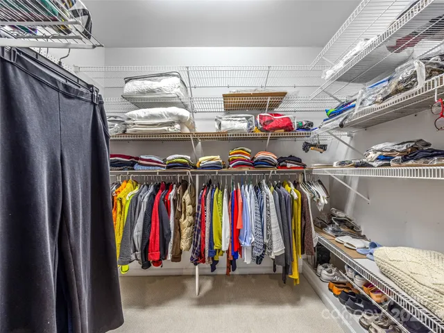 a utility room with sink dryer and washer