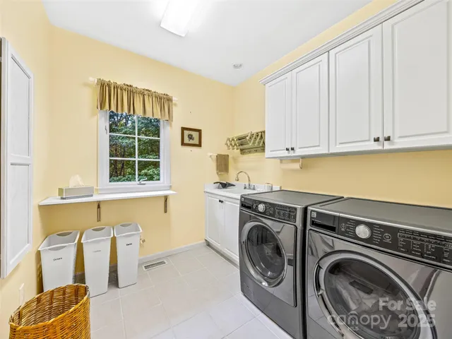 a bathroom with a sink a vanity and a mirror