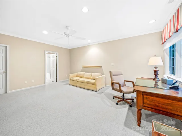 a spacious bathroom with a granite countertop sink a toilet and shower