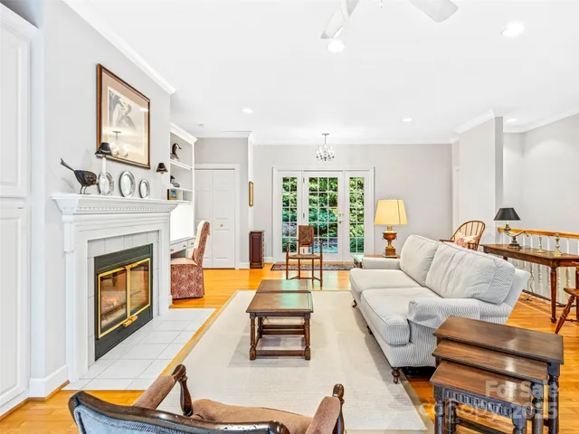 a living room with furniture and a table
