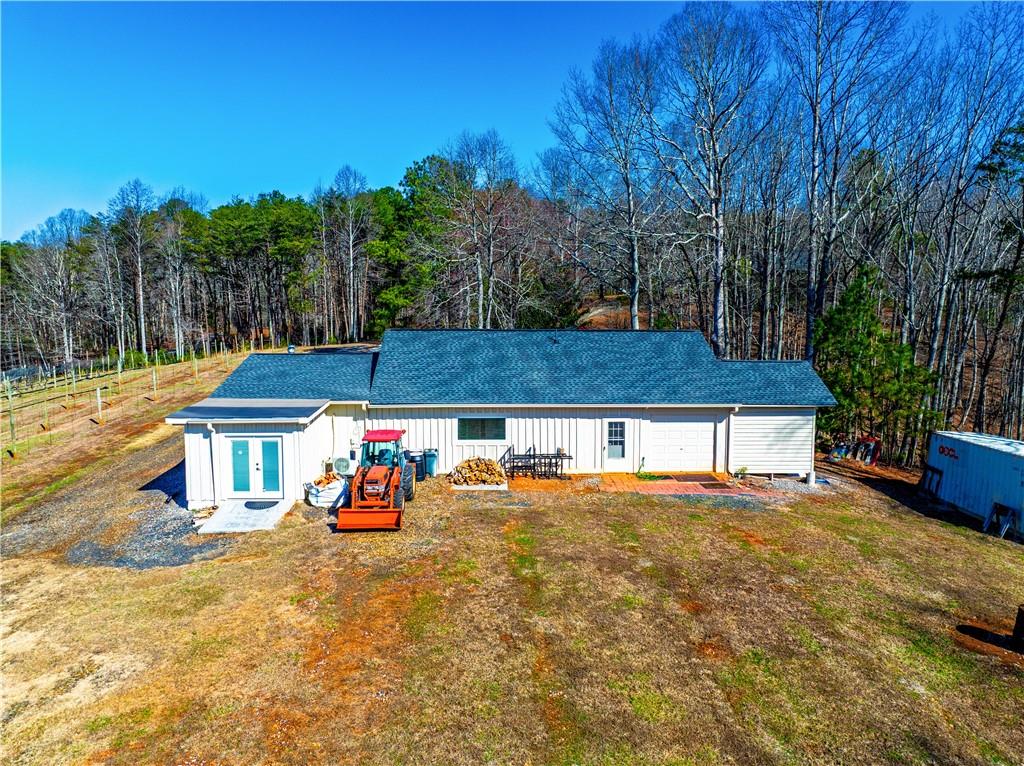 110 Rathgeb Trail Jasper, GA 30143 - Photo 15 of 62 a view of a chairs and table on the wooden floor