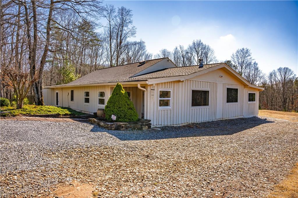 110 Rathgeb Trail Jasper, GA 30143 - Photo 17 of 62 a front view of a house with a yard