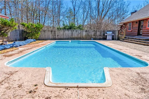 a view of a chairs and tables in the patio