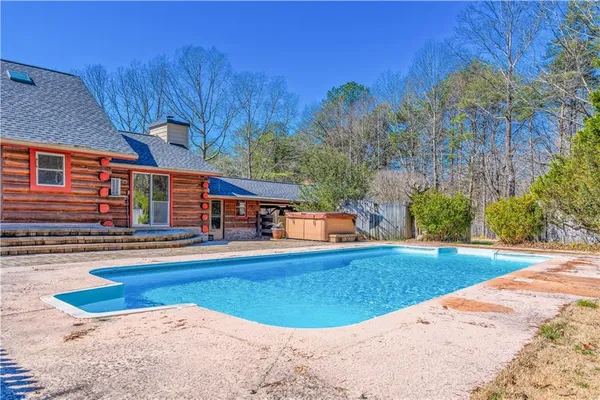 a view of backyard with a patio