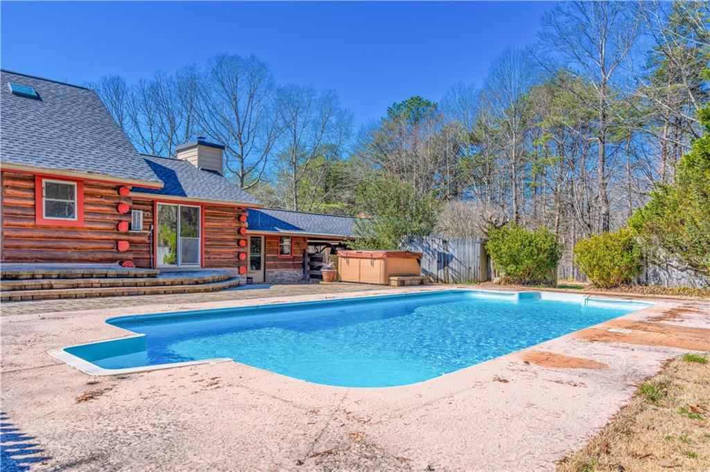 110 Rathgeb Trail Jasper, GA 30143 - Photo 23 of 62 a view of a house with swimming pool